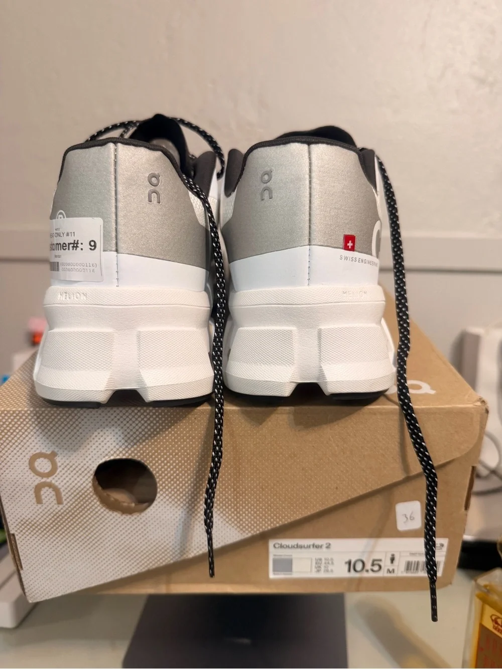 On Running White and Black CloudTec Sneakers